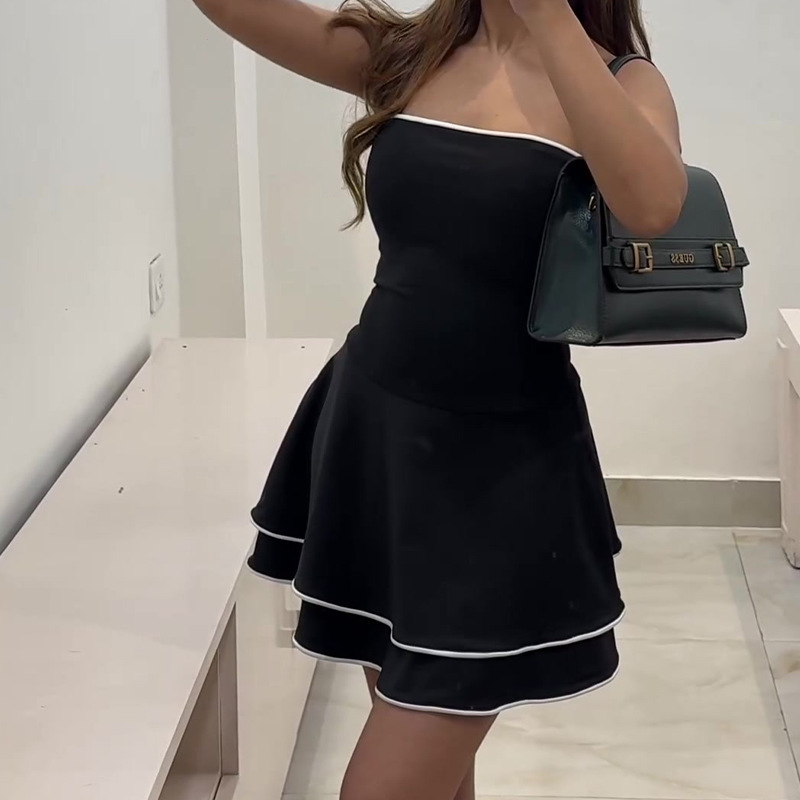 Chic Black Sleeveless Mini Dress with Ruffle Skirt
